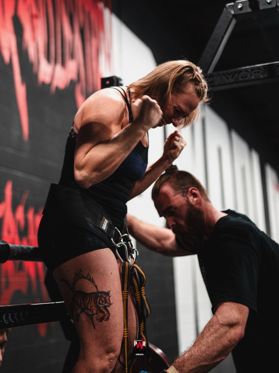 Streetlifting athlete warming up before competition attempts